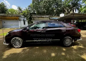 টয়োটা অ্যালিওন ২০১০ মেরুন