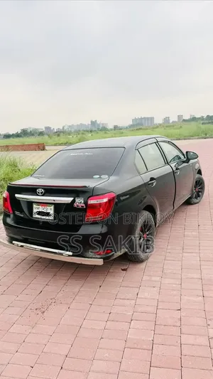 নতুন টয়োটা অ্যাক্সিও ২০১৫ কালো