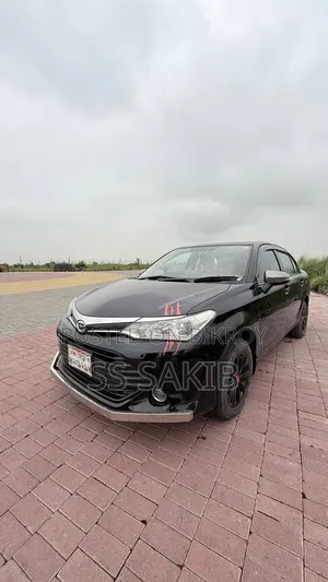 নতুন টয়োটা অ্যাক্সিও ২০১৫ কালো