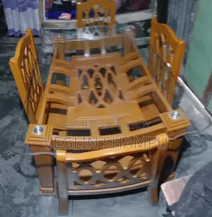 Glass table and 4 chairs for sale. All are in good condition.