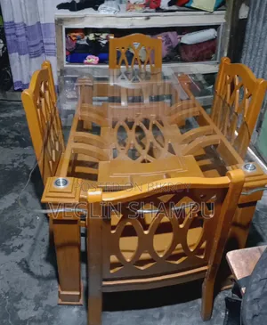 Glass table and 4 chairs for sale. All are in good condition.