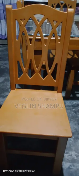 Glass table and 4 chairs for sale. All are in good condition.