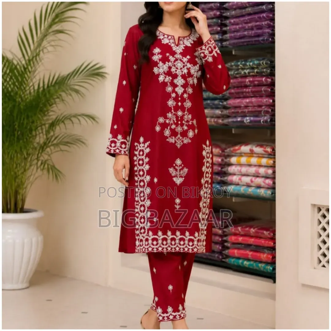 Two-piece set with full-body embroidery work on linen fabric.