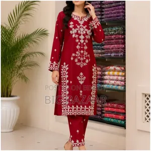 Two-piece set with full-body embroidery work on linen fabric.