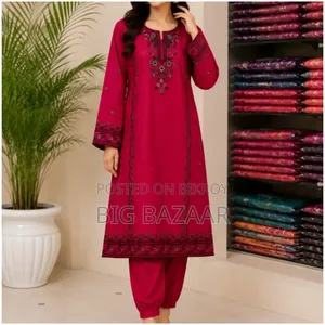 Two-piece set with full-body embroidery work on linen fabric.