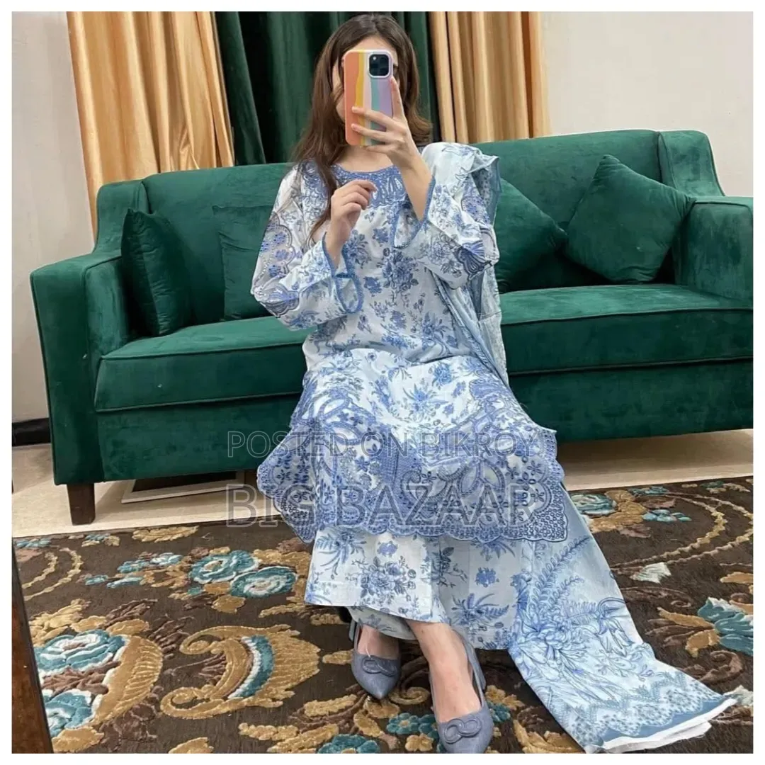 Three-piece set with full-body embroidery work on cotton fabric.