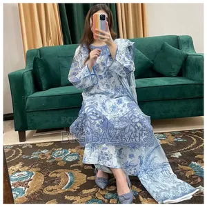 Three-piece set with full-body embroidery work on cotton fabric.