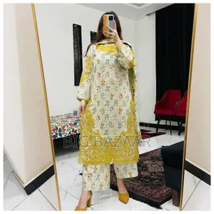 Three-piece set with full-body embroidery work on cotton fabric.