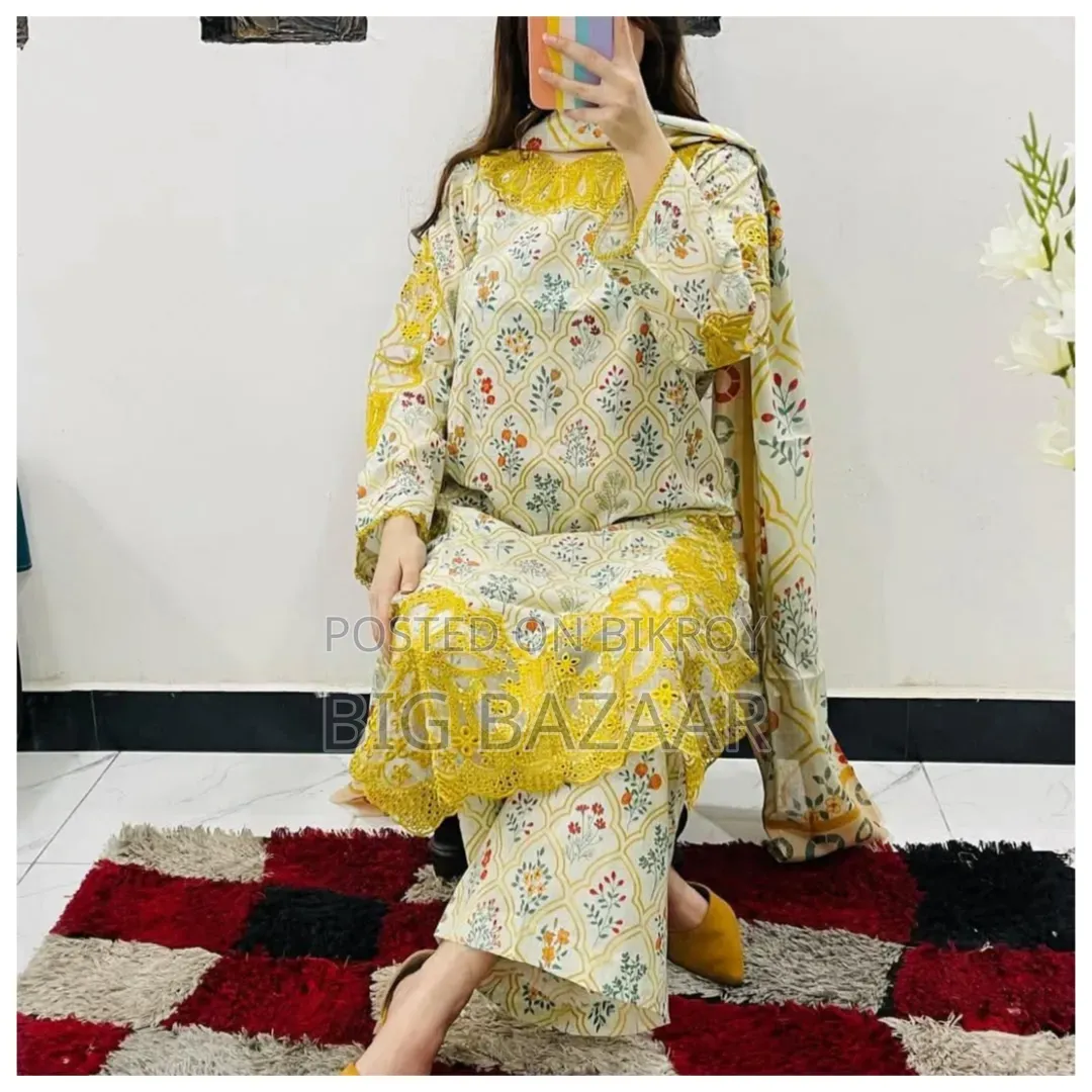 Three-piece set with full-body embroidery work on cotton fabric.