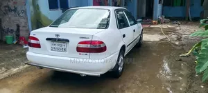 New Toyota Corolla Sedan 1999 White