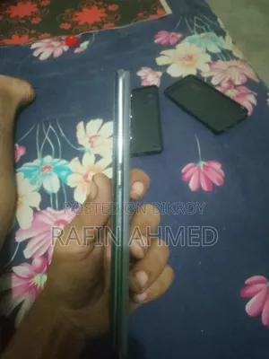 নতুন রিয়েলমি জিটি মাস্টার এডিশন ১২৮ জিবি অরেঞ্জ