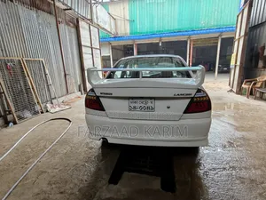 Mitsubishi Lancer 1999 White