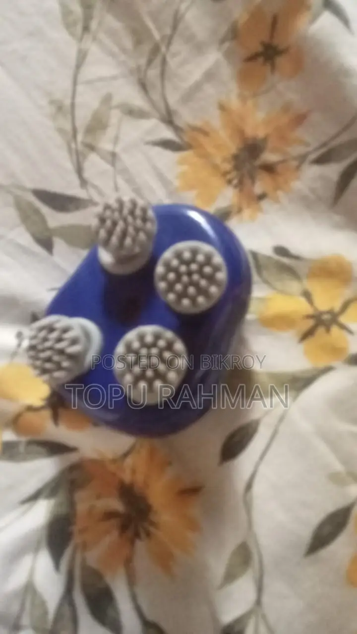 ইলেকট্রিক স্ক্যাল্প ম্যাসাজার