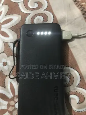 Power Bank With 4 Cable Attached