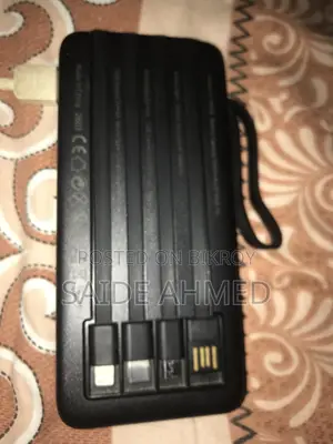 Power Bank With 4 Cable Attached
