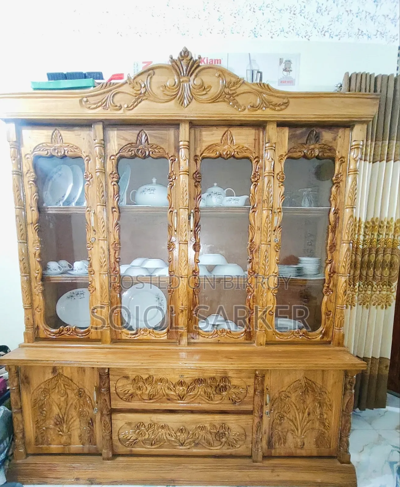 Beautiful Wooden Crockery Showcase – Glass Door & Carving Design