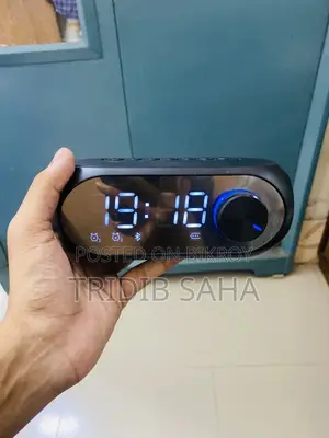 Speaker + Clock