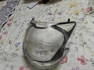 বাজাজ পালসার হেডলাইট কভার
