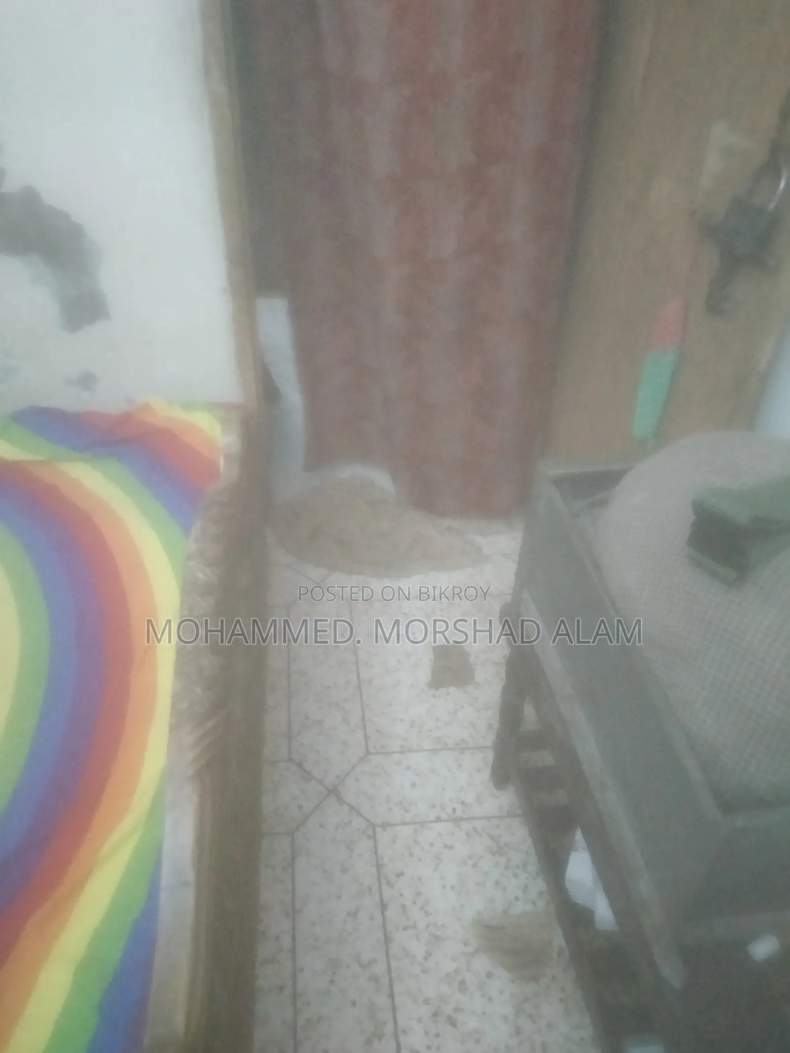 সেগুন কাঠের খাট।