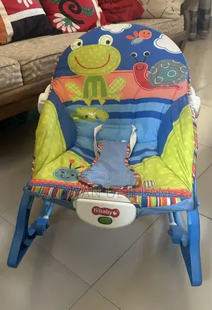 Infant Rocker With Vibrations & Toy Bar