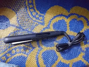 চুল সোজা করার মেশিন