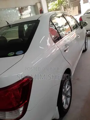 টয়োটা এক্সিও ২০১৩ সাদা