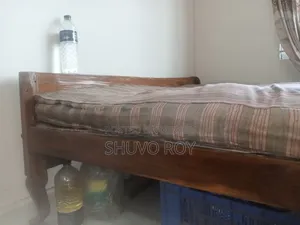কাঠের খাট ও তোশক