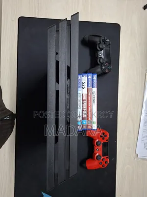 PS4 Pro 1TB (CUH-7202B) + 2 Controllers + 9 Games