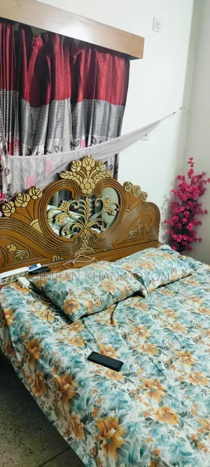 Bed Set With Corner Flowers.