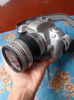 Nikon লেন্স সহ বিক্রি করা হবে