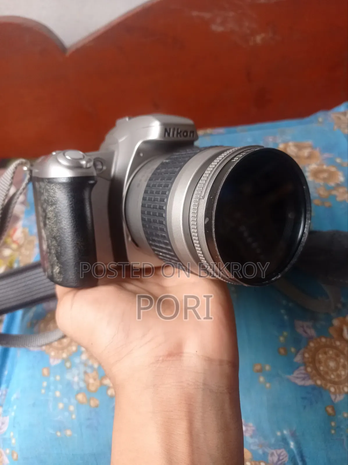 Nikon লেন্স সহ বিক্রি করা হবে