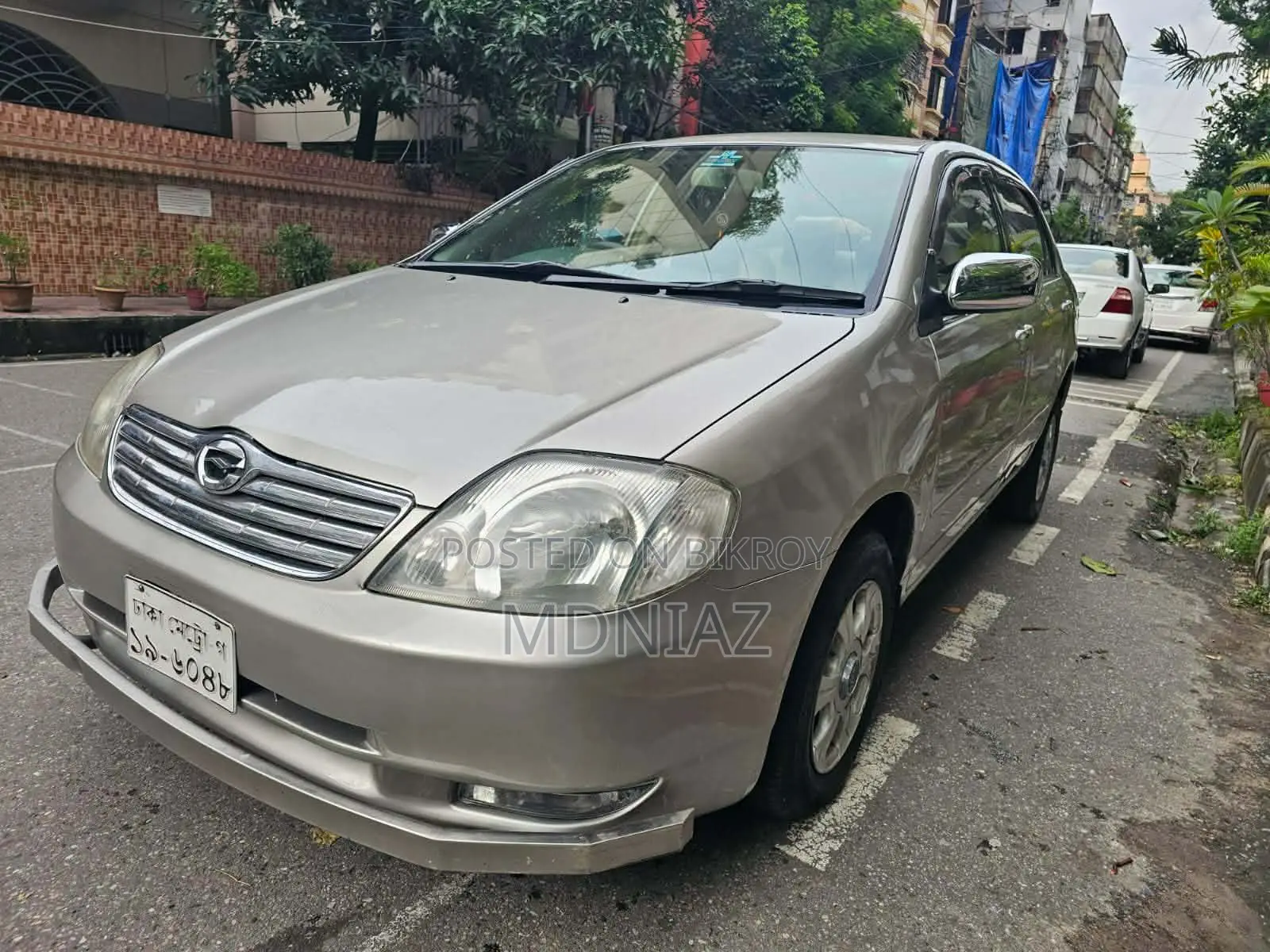 টয়োটা করোলা সেডান অটোমেটিক ২০০৩ গোল্ড