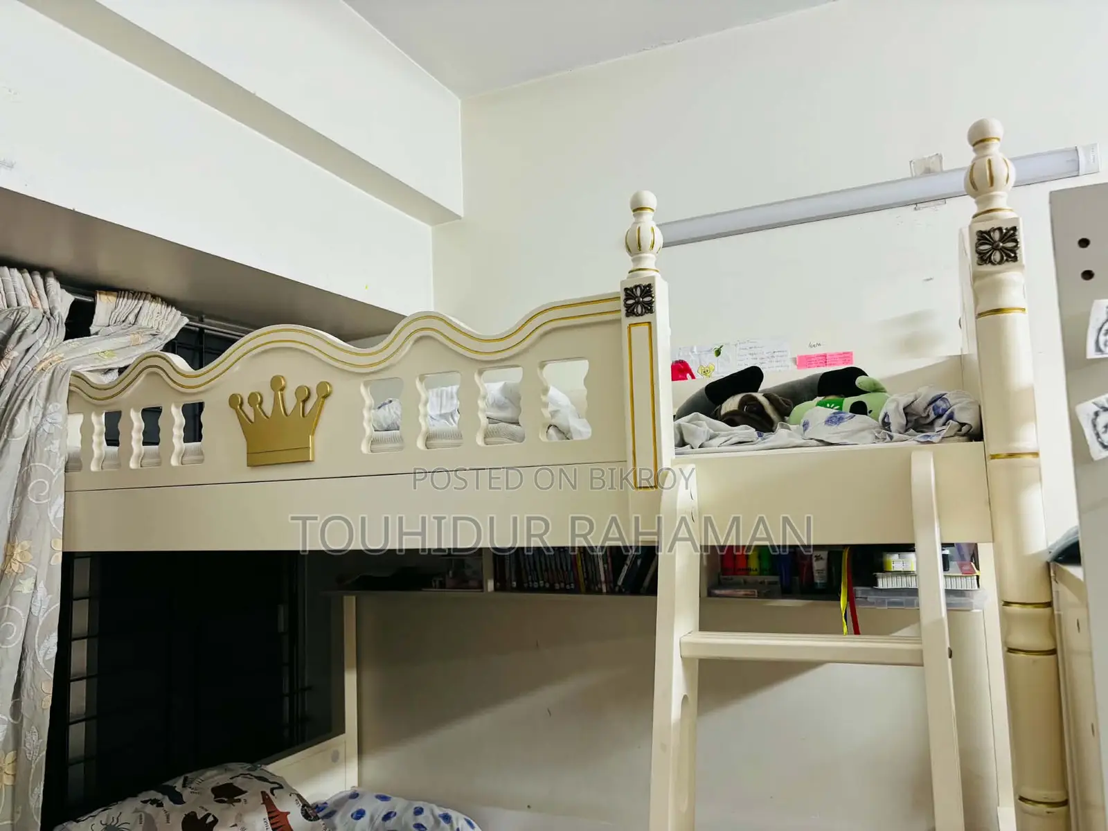 Castle-Themed Wooden Bunk Bed in a Child's Bedroom.