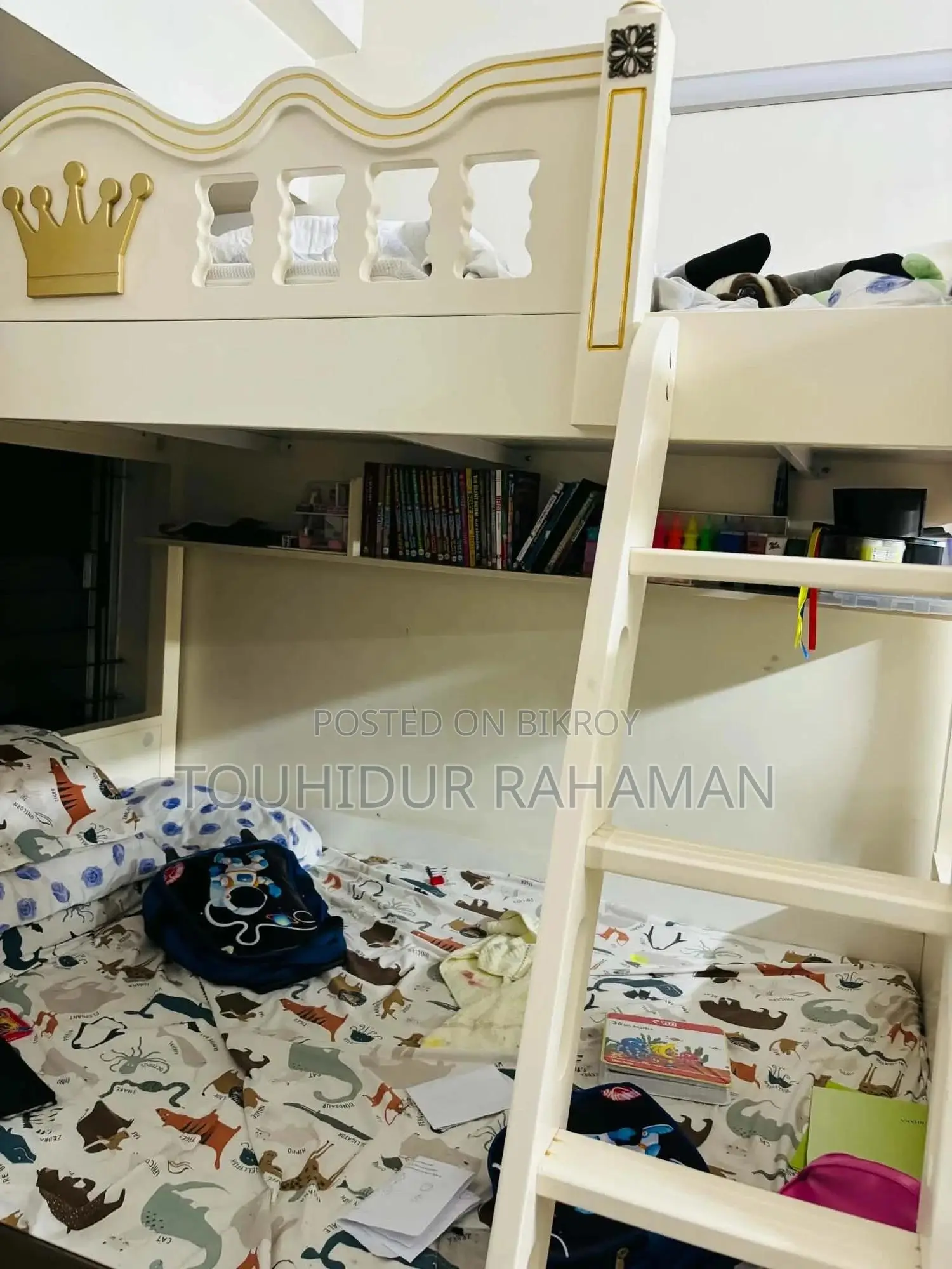 Castle-Themed Wooden Bunk Bed in a Child's Bedroom.