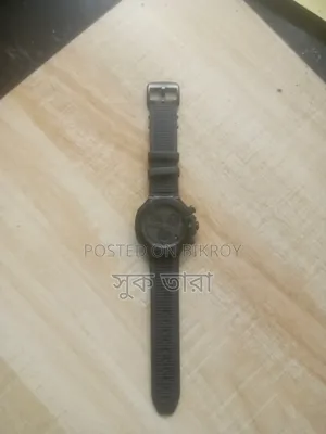 Tissot T-Race Quartz Chronograph (Model: T141417 A) ঘড়ি আছে।