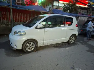 Toyota Porte 2009 Pearl
