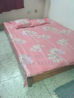 Queen Size Bed and a King Size Mattress