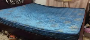 Queen Size Bed and a King Size Mattress