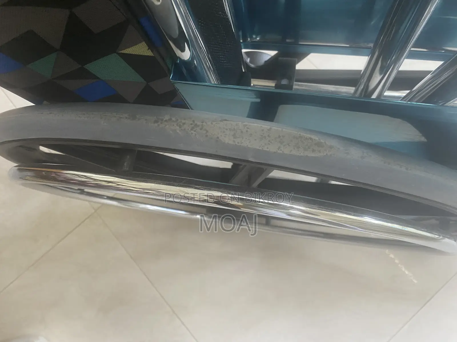 Used Manual Wheelchair – Good Condition, Slightly Damaged Wheels.