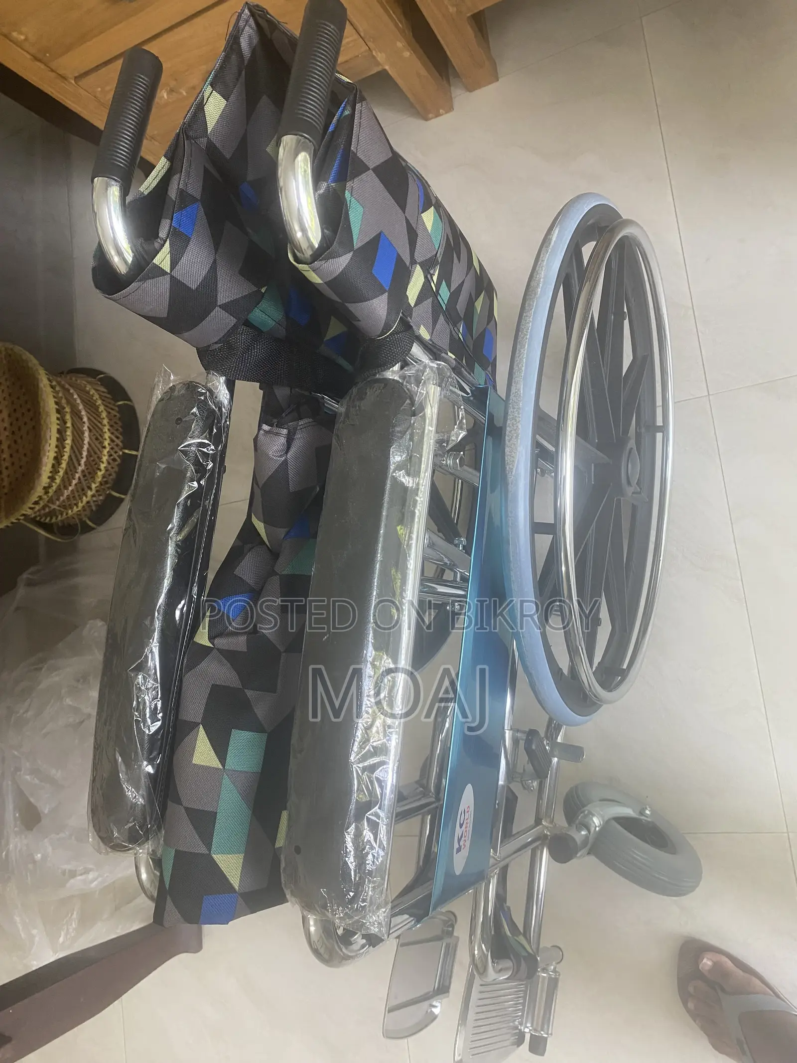Used Manual Wheelchair – Good Condition, Slightly Damaged Wheels.