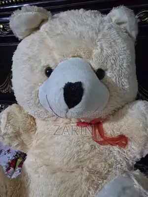 Large, Light Cream-Colored Plush Teddy Bear