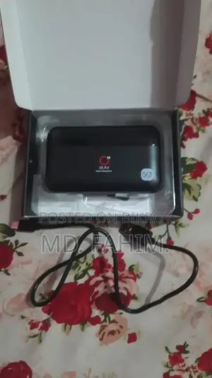 OLAX M100 4G Dual Band WiFi 6 Pocket Router With 10000 Mah Battery