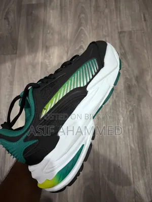 Puma X Aston Martin Aramco F1 Team Rs Surge Low Sneakers Unisex