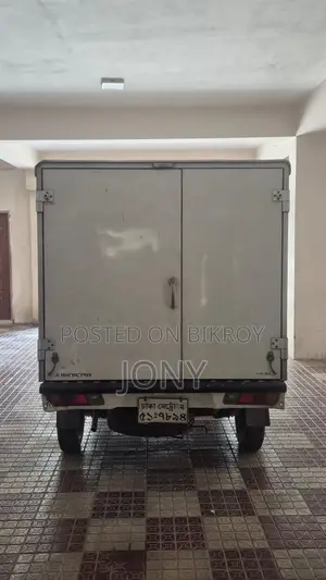 Mitsubishi L300 2011 White