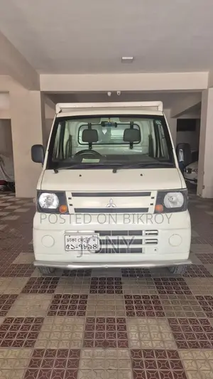 Mitsubishi L300 2011 White