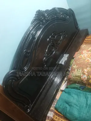 Sturdy and beautiful box bed made of mahogany wood for sale.