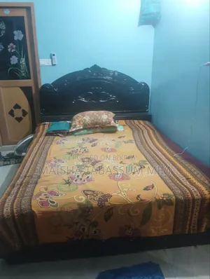 Sturdy and beautiful box bed made of mahogany wood for sale.