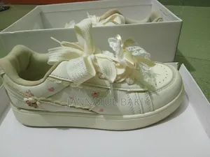 Balletcore-Inspired Lace Ribbon Sneakers