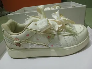 Balletcore-Inspired Lace Ribbon Sneakers