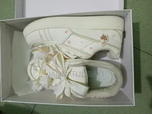 Balletcore-Inspired Lace Ribbon Sneakers